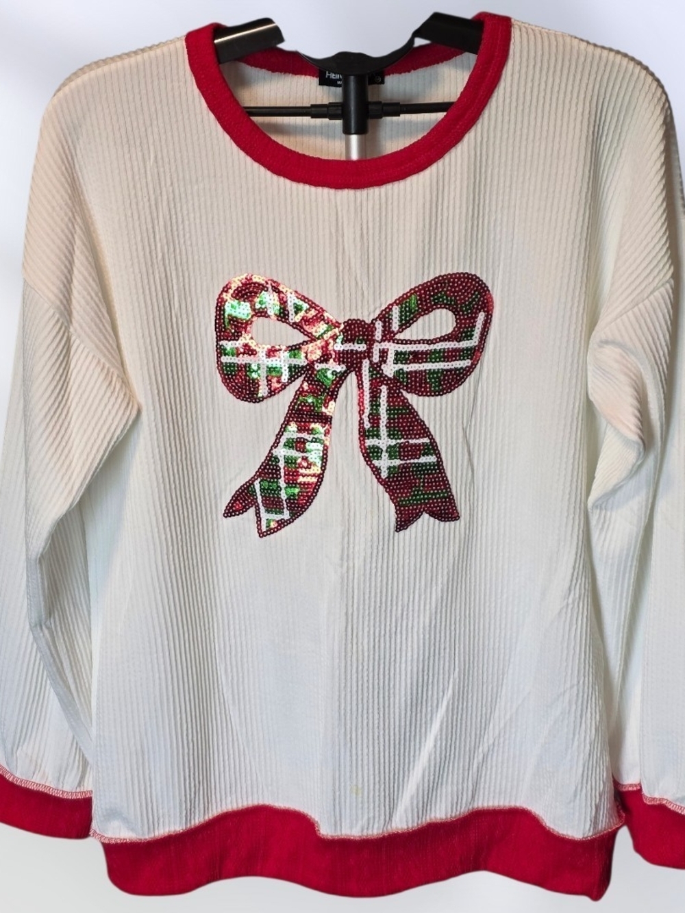 Women’s Cream Ribbed Sweater with Red Trim and Sequin Bow Accent